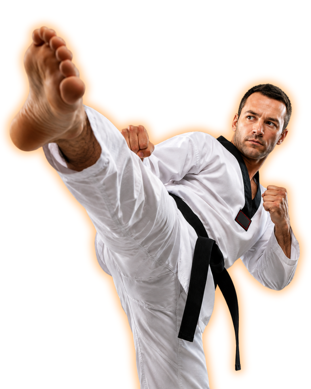 Adult martial arts student performing a high kick during Taekwondo training at Tennessee Taekwondo in Mt. Juliet, Tennessee