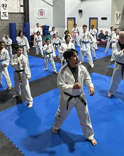Martial arts students training together at Tennessee Taekwondo