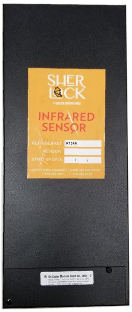 A black box with a red label that says sher lock infrared sensor