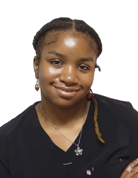 Portrait of a smiling person with braided hair, red earrings, and a black top against a white background