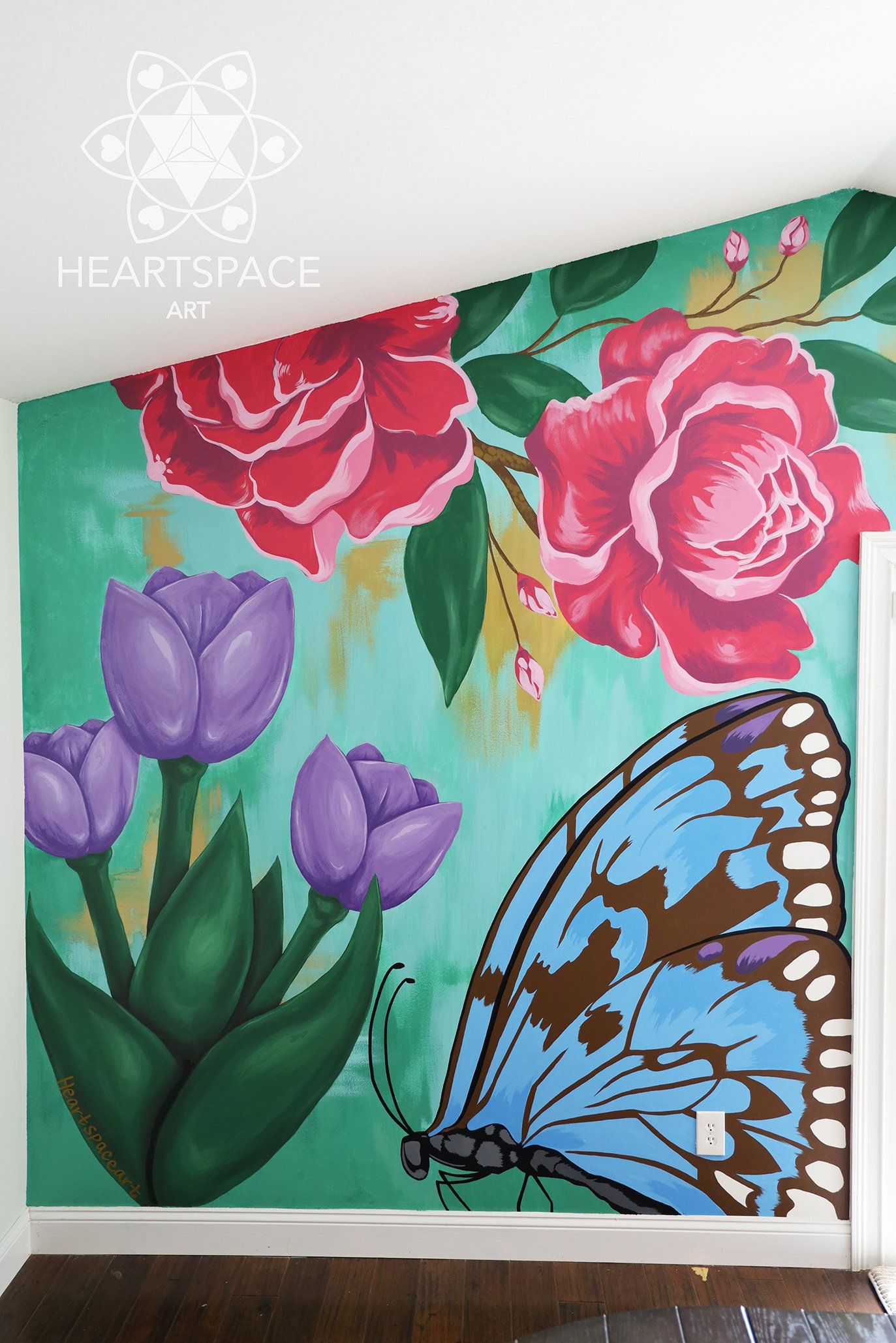 Hand painted mural located in residential home in Jacksonville, Florida. Features roses, daisies, tulips, and butterfly.