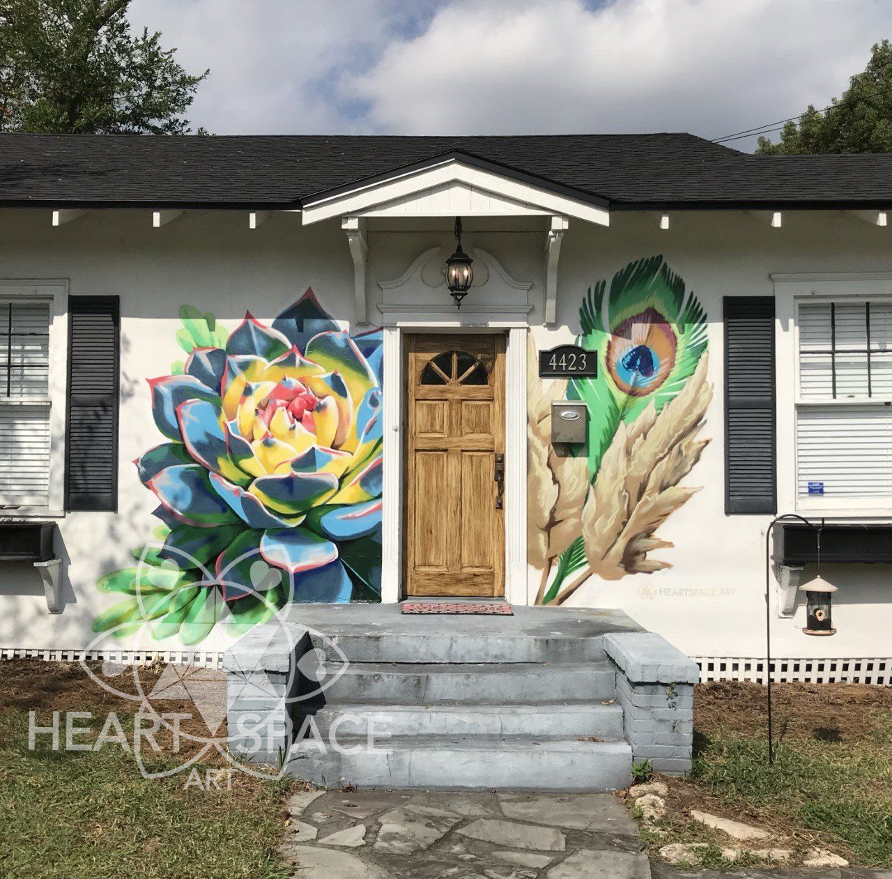 A spray painted mural outside an Airbnb, located in Avondale in Riverside Jacksonville, Florida.