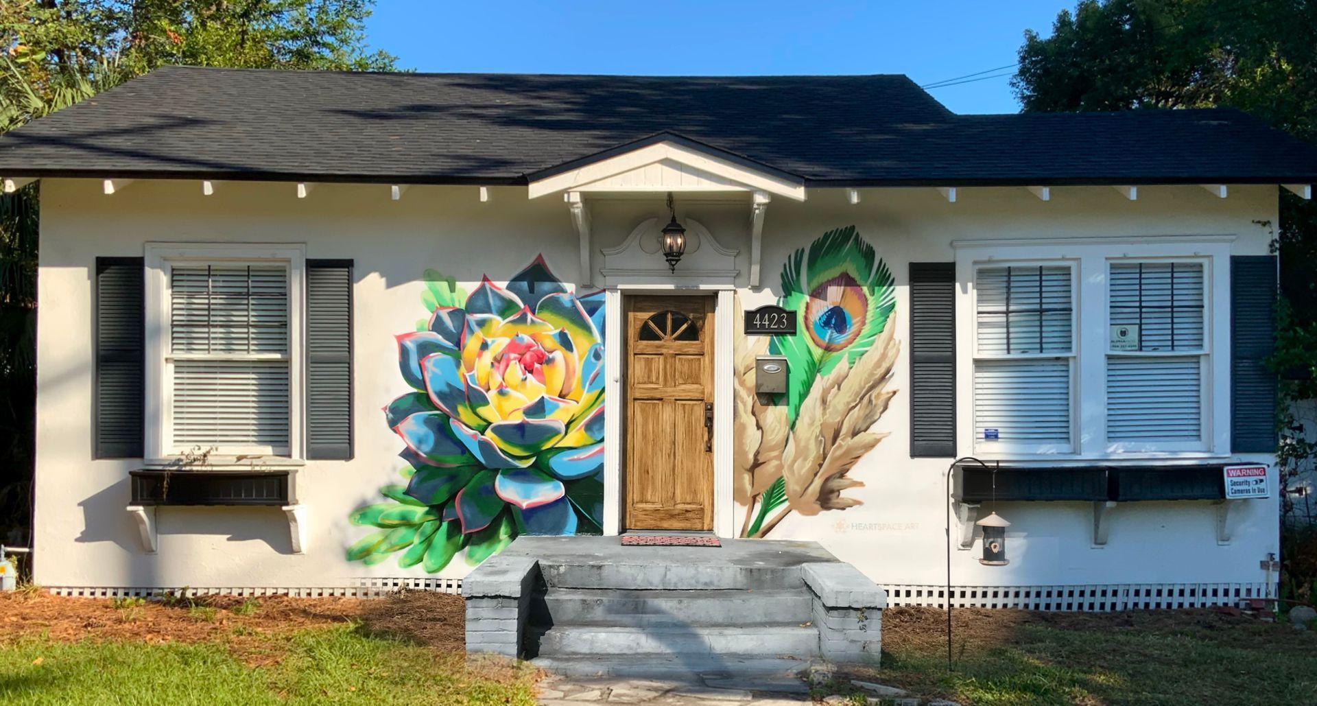 A spray painted mural outside an Airbnb, located in Avondale in Riverside Jacksonville, Florida.