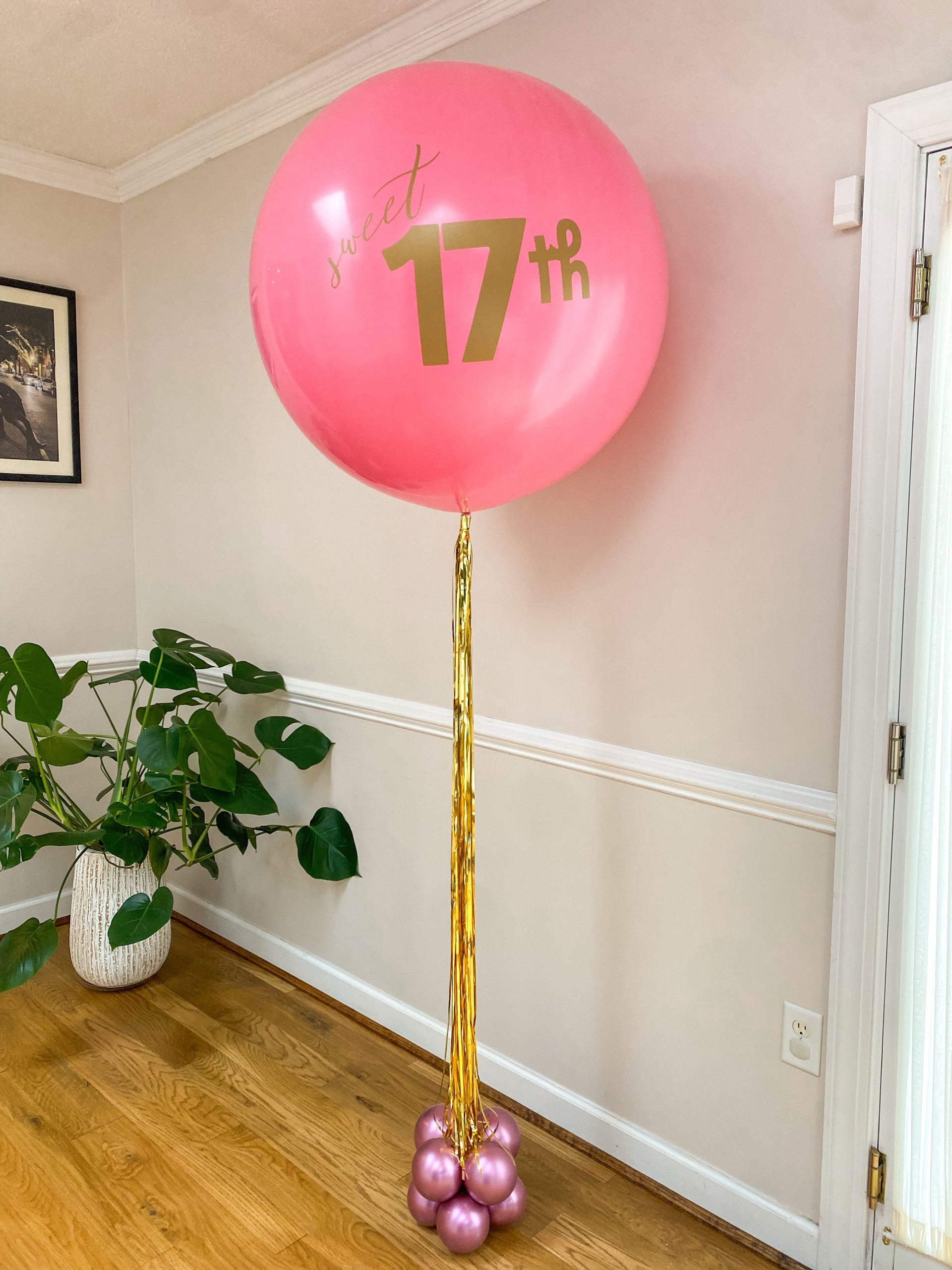 A pink balloon with the number 17 on it