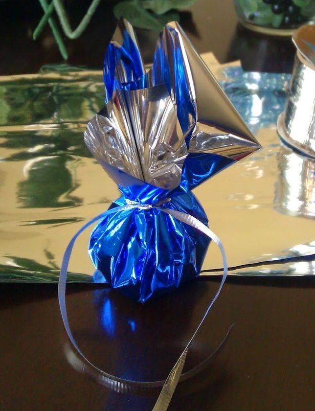A blue and silver wrapped item is on a table