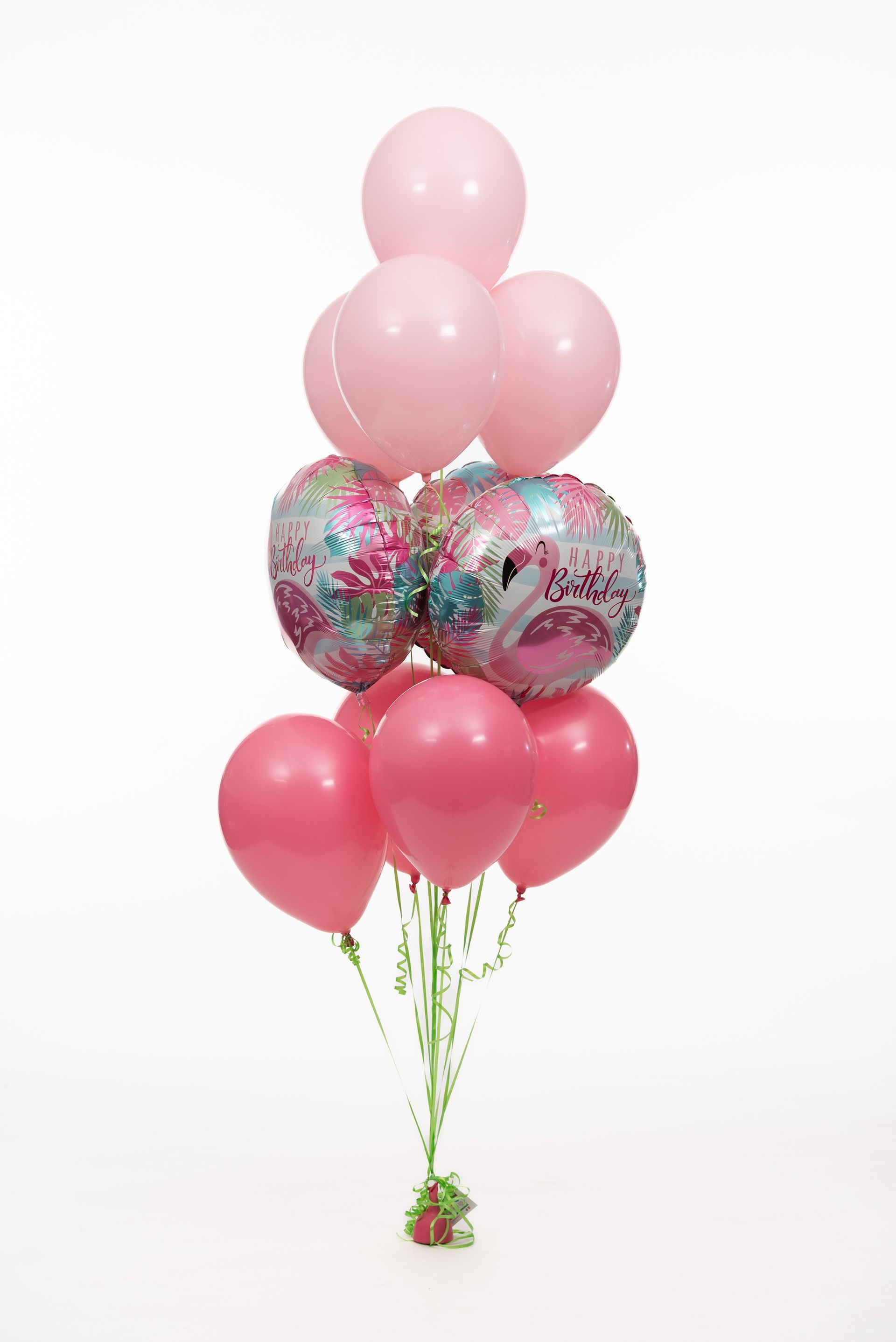 A bunch of pink balloons stacked on top of each other on a white background.