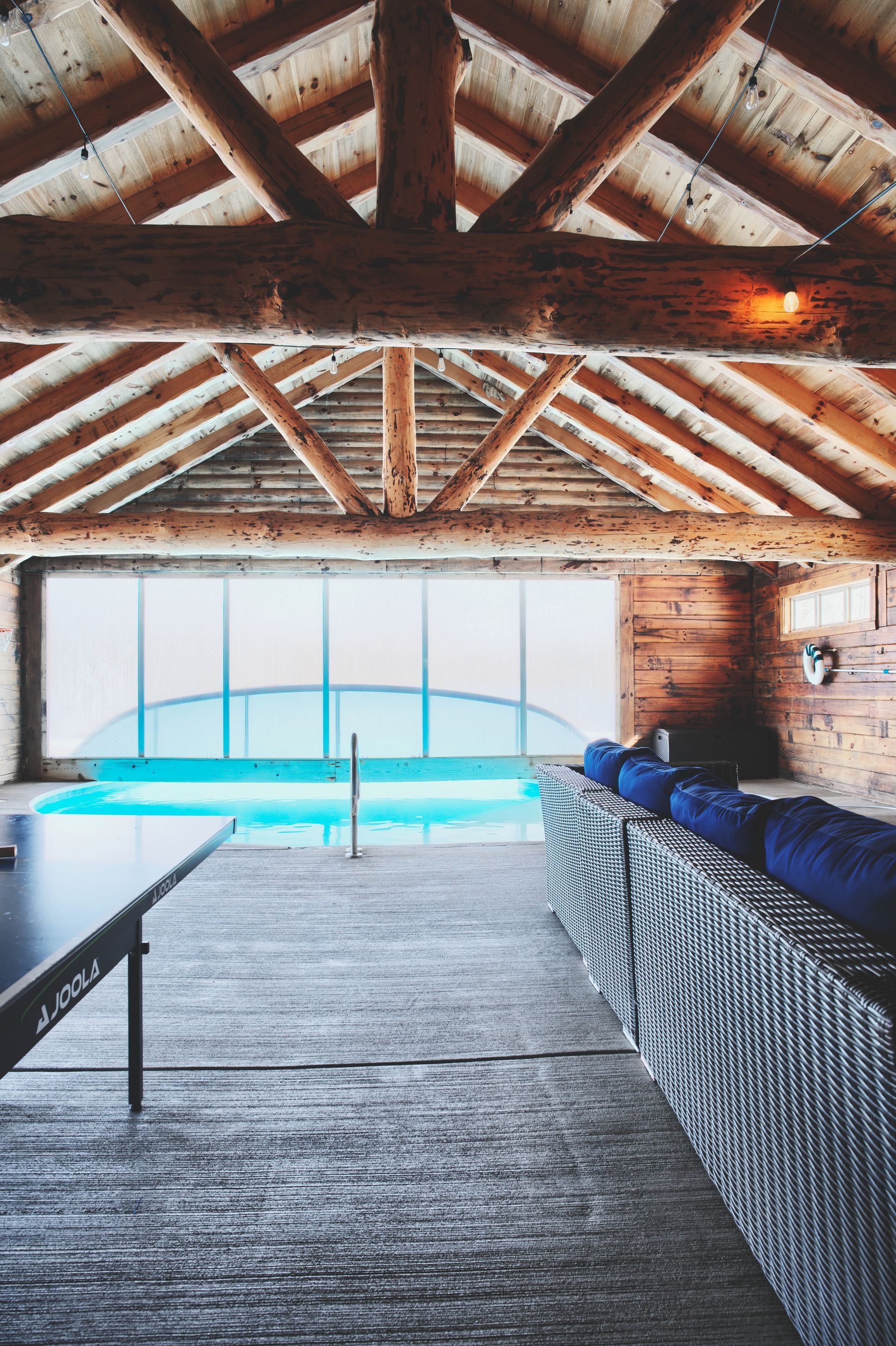 There is a swimming pool in the middle of the room.