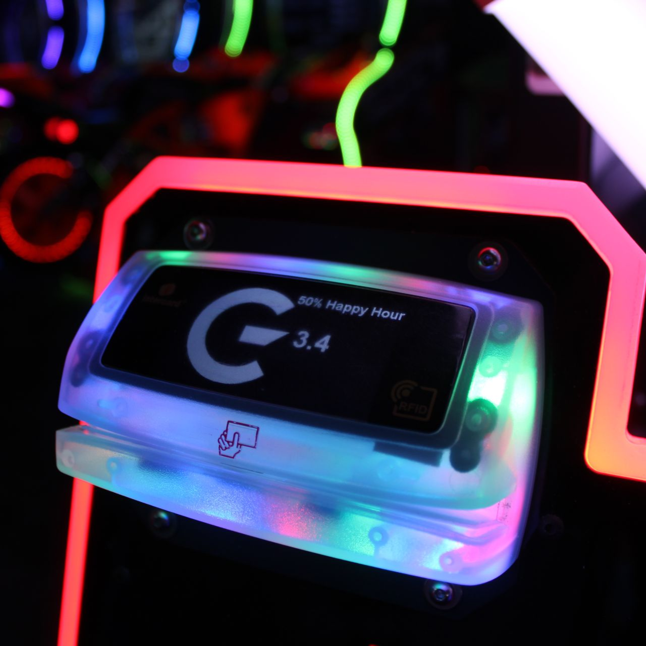 Contactless arcade card reader with happy hour display at GRID Arcade The Grid Pleasant Grove Utah