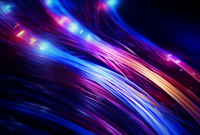 Glowing fiber optic cables in shades of blue, purple, and orange against a dark background.