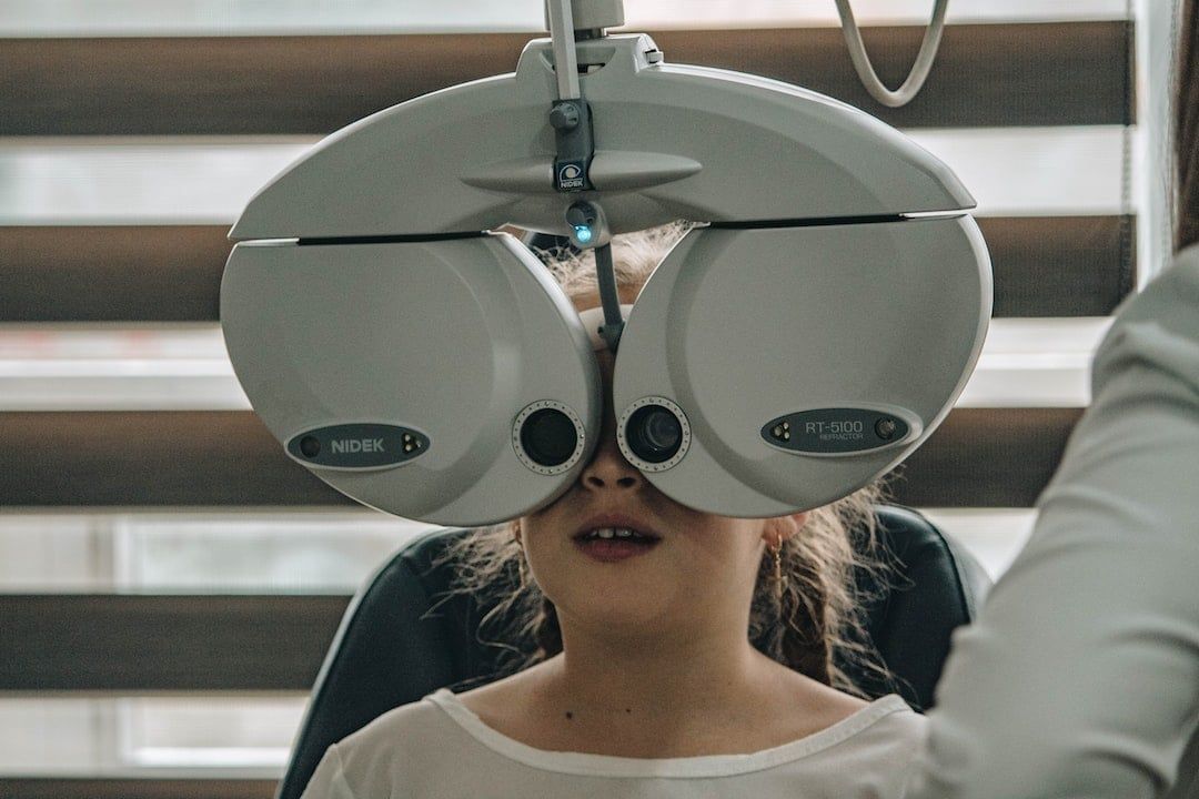 South Shore Eye Associates optometrist with patient during comprehensive eye exam