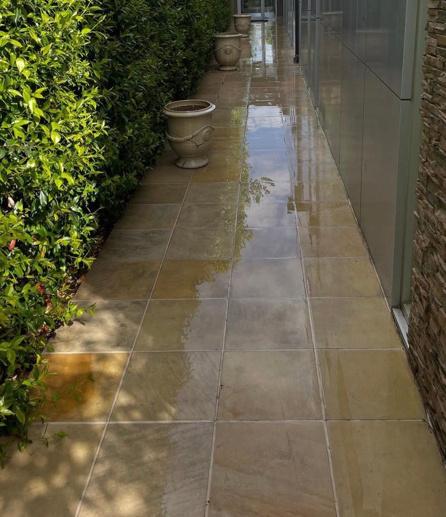 Showing off what the Caddy Bins team can do. Awesome pressure washing of tiles