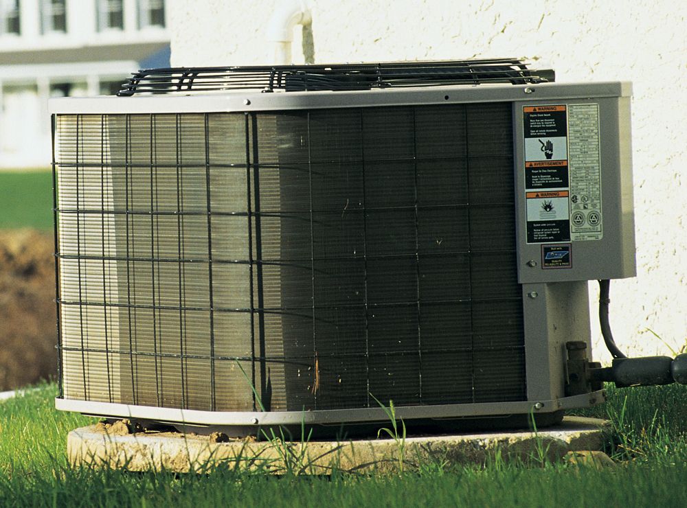 inspecting outdoor HVAC unit