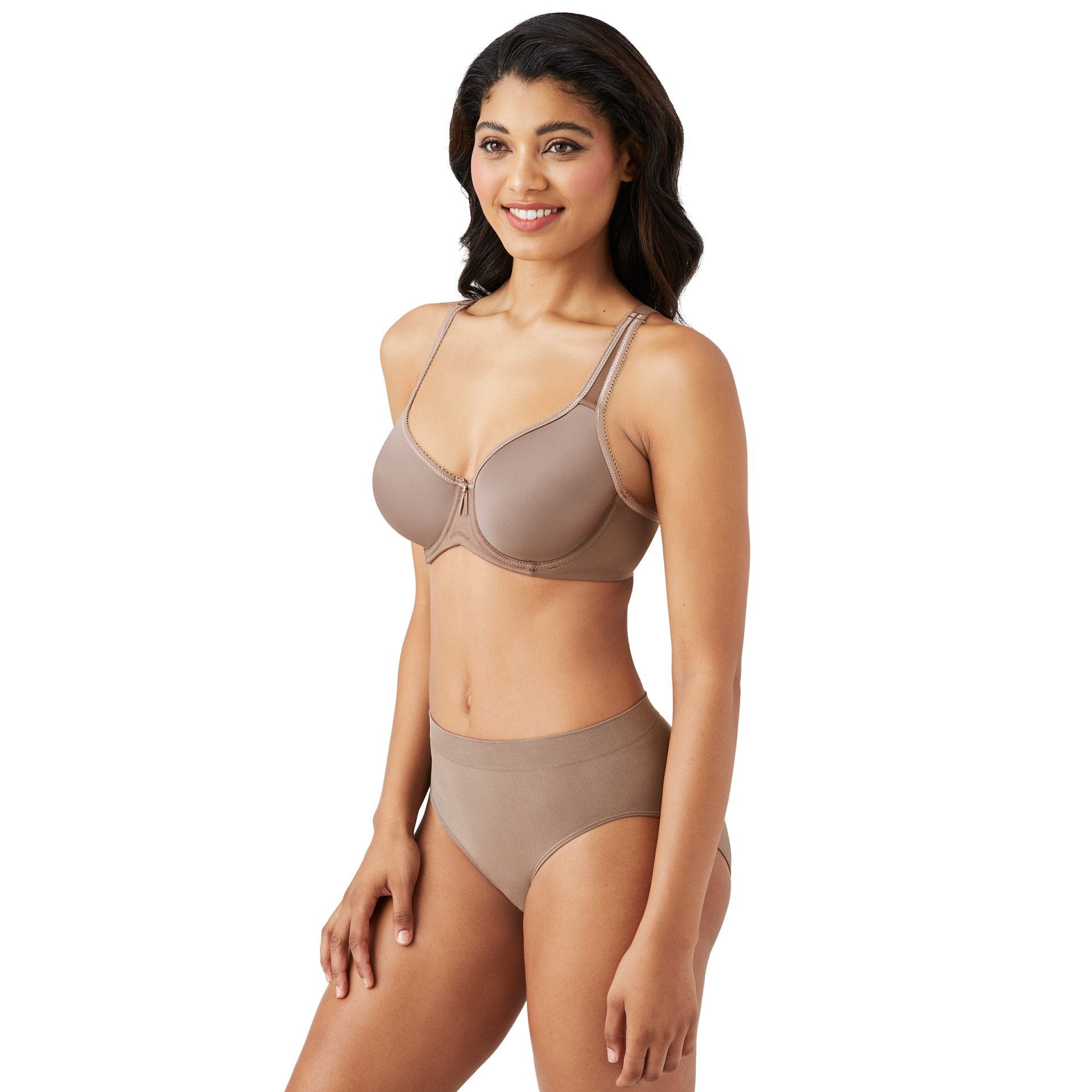 Woman modeling taupe bra and underwear on a white background