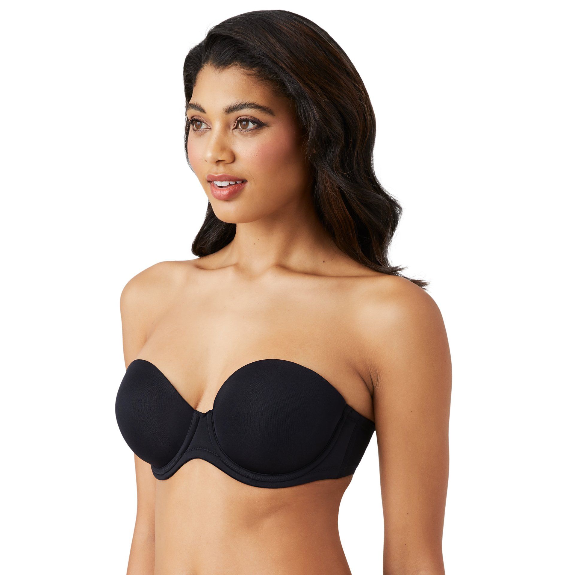 Woman wearing a black strapless bra, facing slightly left on a white background