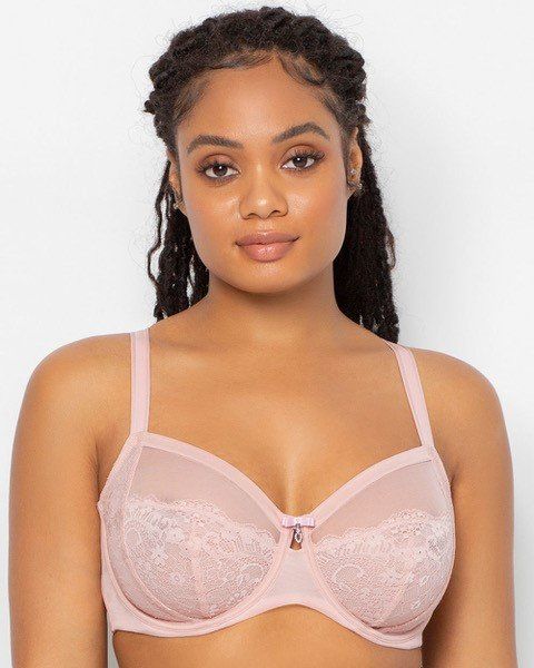 Model wearing a light pink lace bra, facing forward against a plain white background.
