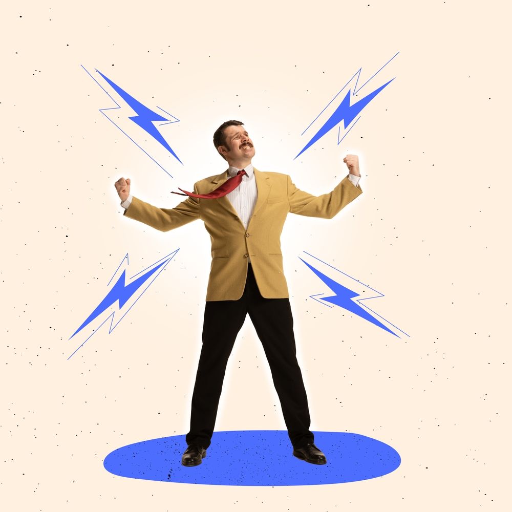 A man in a suit and tie is surrounded by lightning bolts.