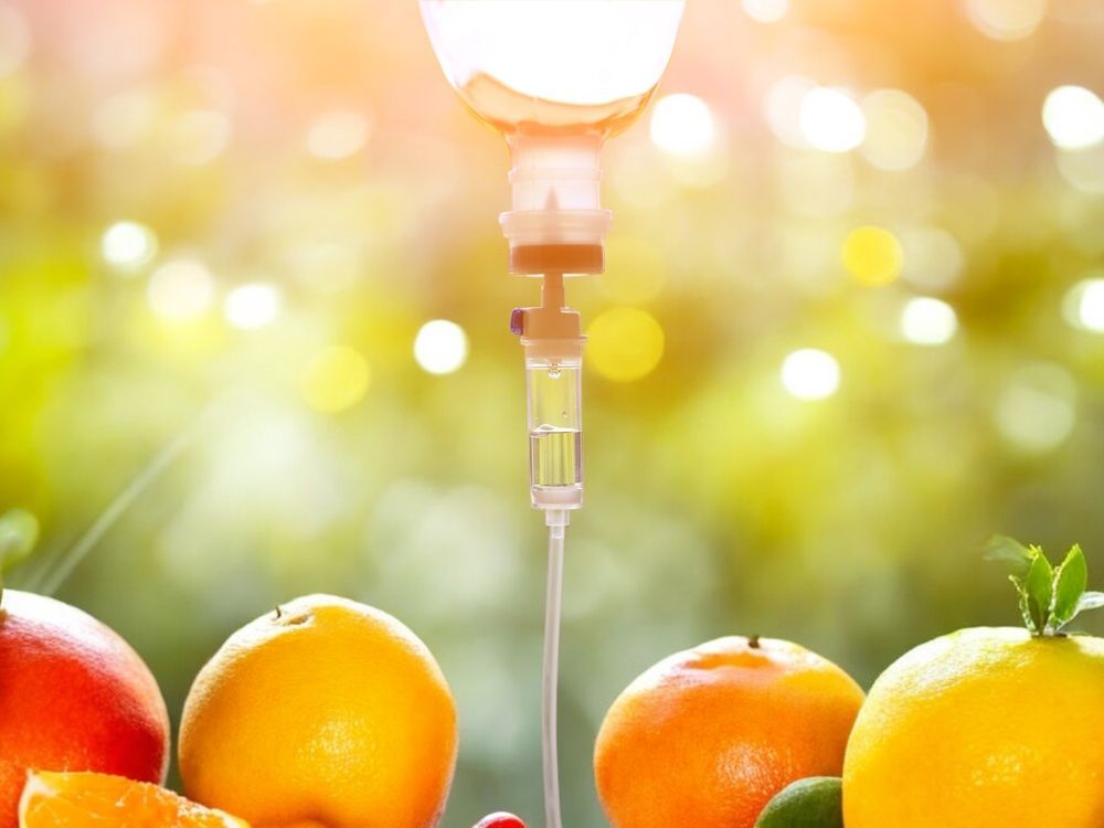 A close up of a drip surrounded by fruit.