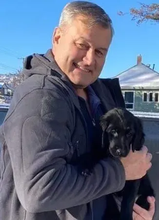Happy Highpoint Flatcoated Retriever owner