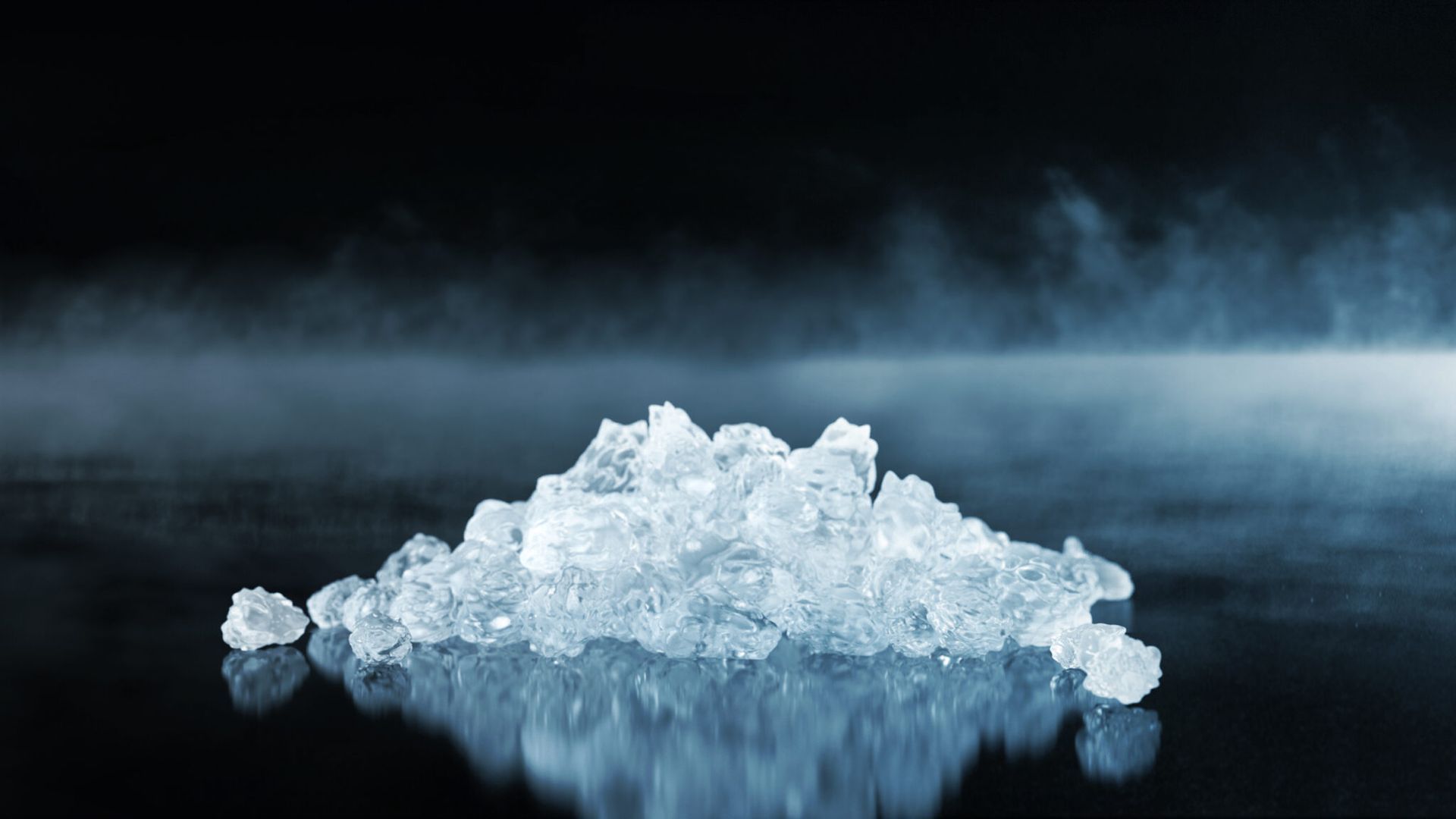 A Pile Of Ice Is Sitting On A Table With Smoke Coming Out Of It — Eureka Water & Filtration In Mount St John, QLD