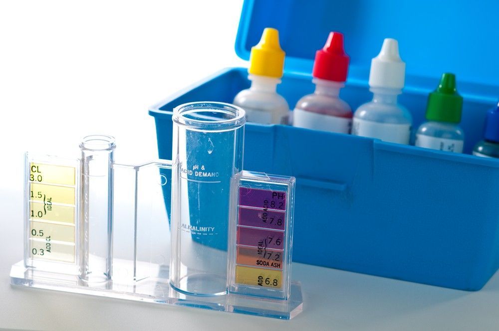 A Blue Box Filled With Test Tubes And Bottles — Eureka Water & Filtration In Mackay, QLD