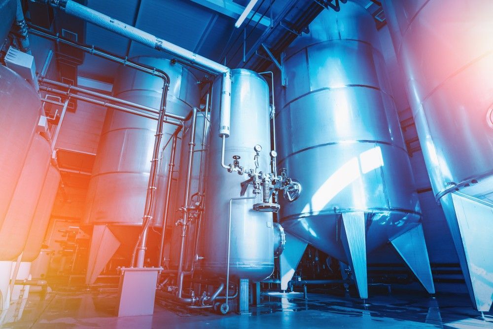 A Factory With A Lot Of Stainless Steel Tanks And Pipes — Eureka Water & Filtration In Cairns, QLD
