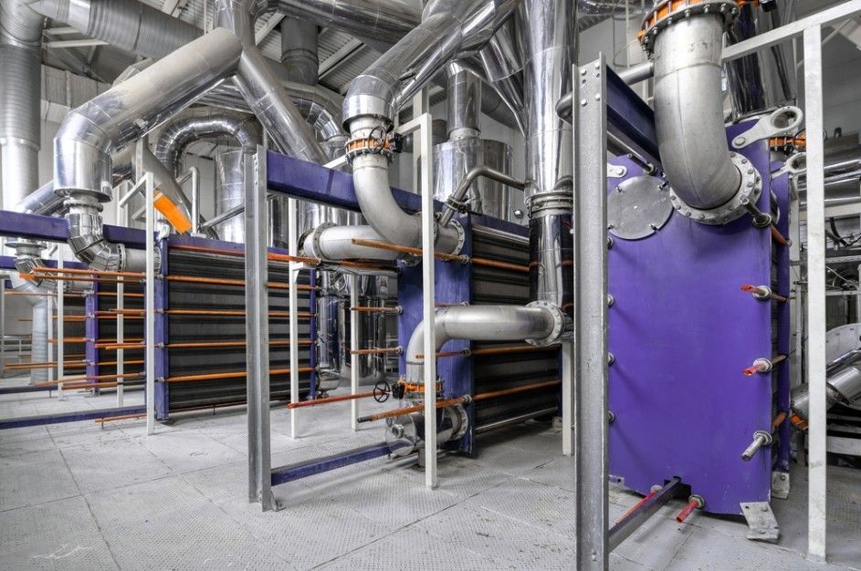 A Factory With A Lot Of Pipes And Tubes In It — Eureka Water & Filtration In Cairns, QLD