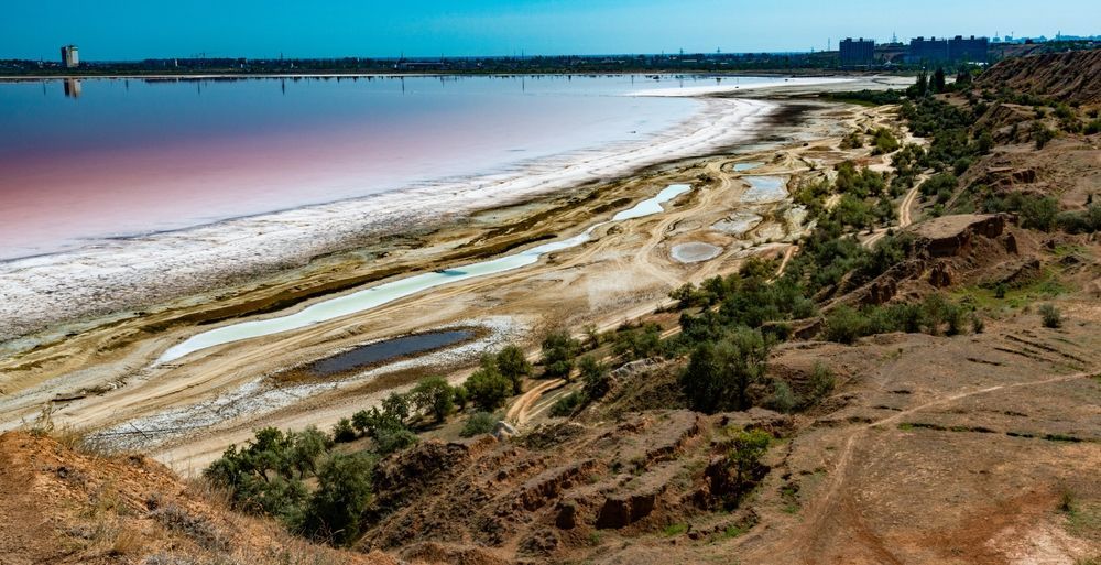 An Aerial View Of A Large Body Of Water Surrounded By Trees — Eureka Water & Filtration In Mount St John, QLD