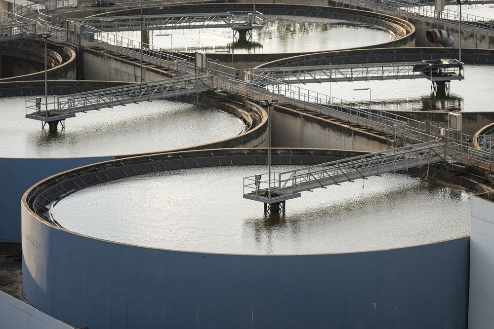 A Water Treatment Plant With A Lot Of Tanks Filled With Water — Eureka Water & Filtration In Mount Isa, QLD