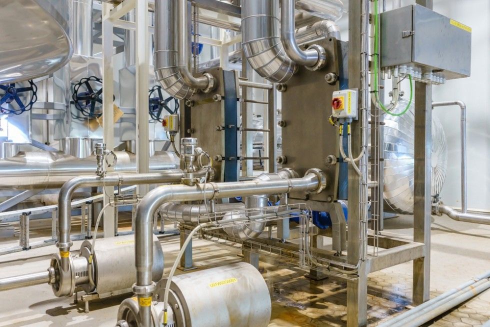A Factory With A Lot Of Stainless Steel Pipes And Valves — Eureka Water & Filtration In Mackay, QLD