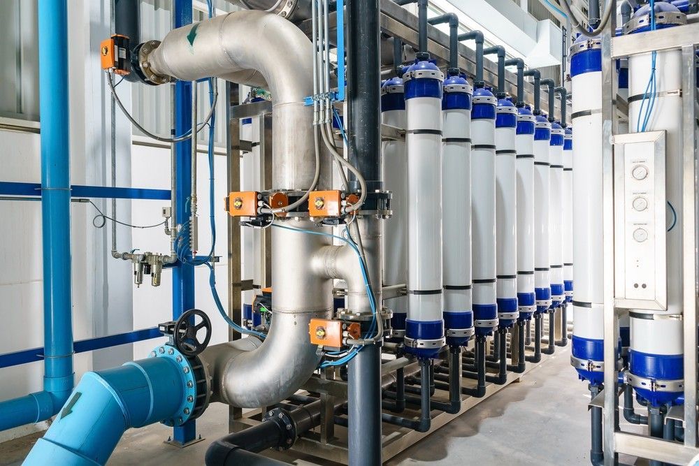 A Room Filled With Lots Of Pipes And Valves In A Factory — Eureka Water & Filtration In Mount Isa, QLD