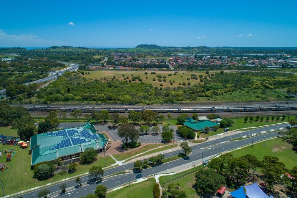 Aerial View of a Park With a Train Going by — Wilson's House Restumping in Mullumbimby, NSW