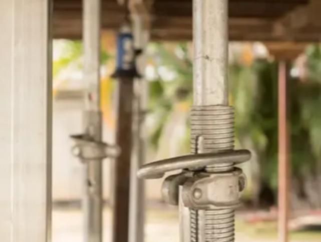 Close Up of a Metal Pole With a Handle on It — Wilson's House Restumping in Mullumbimby, NSW
