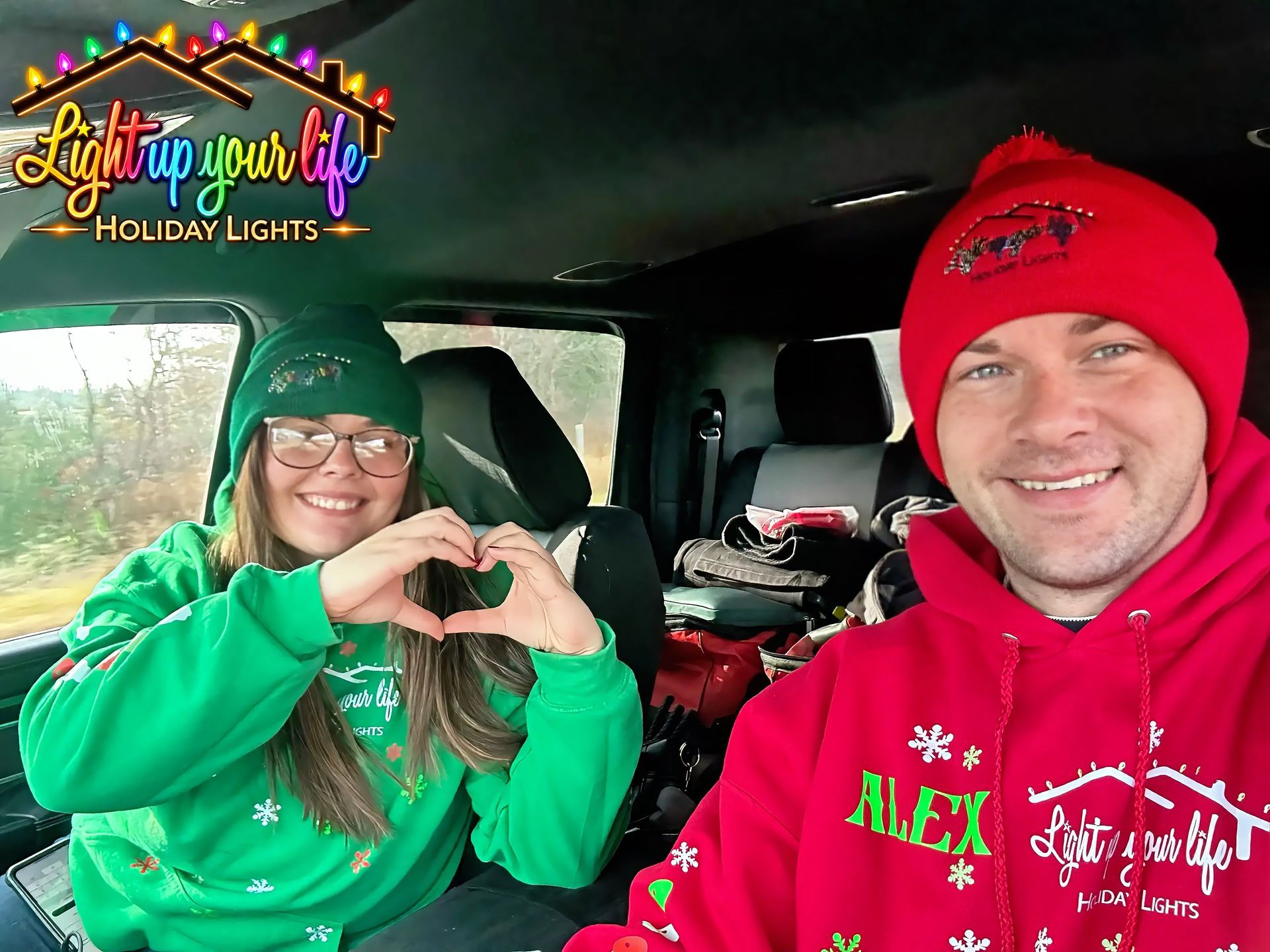 Light up your life Holiday Lights crew safely installing lights all across the whole state of michigan! 