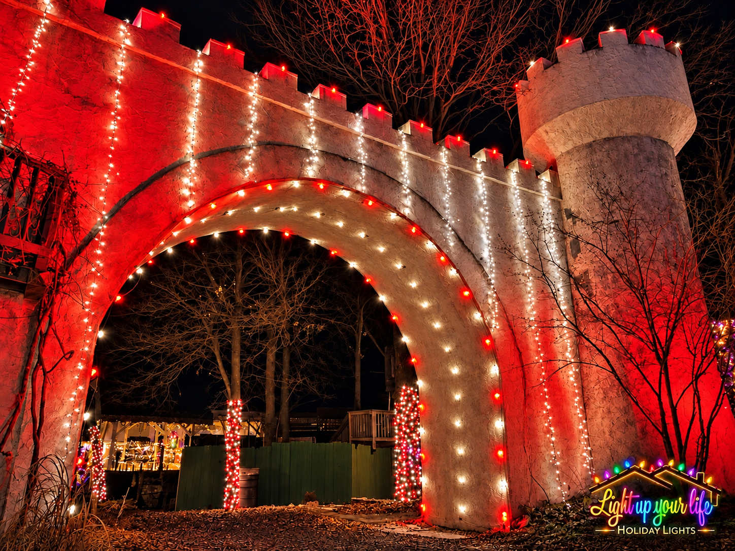 Commercial Christmas Lights in Holly Michigan Castle decorated with c9s and mini light curtain wall 