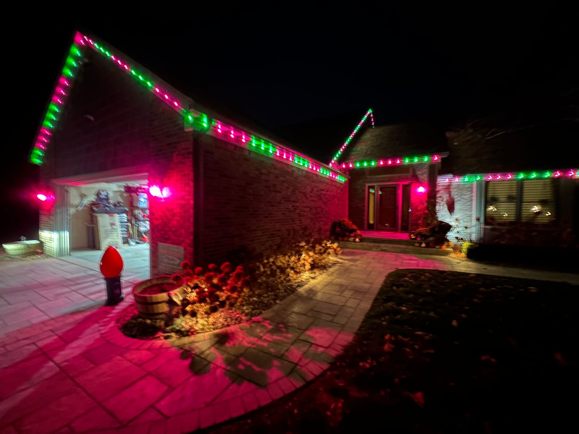 Pink and green professional grade inception blue hopper permanent lighting system authorized installers in Michigan. 