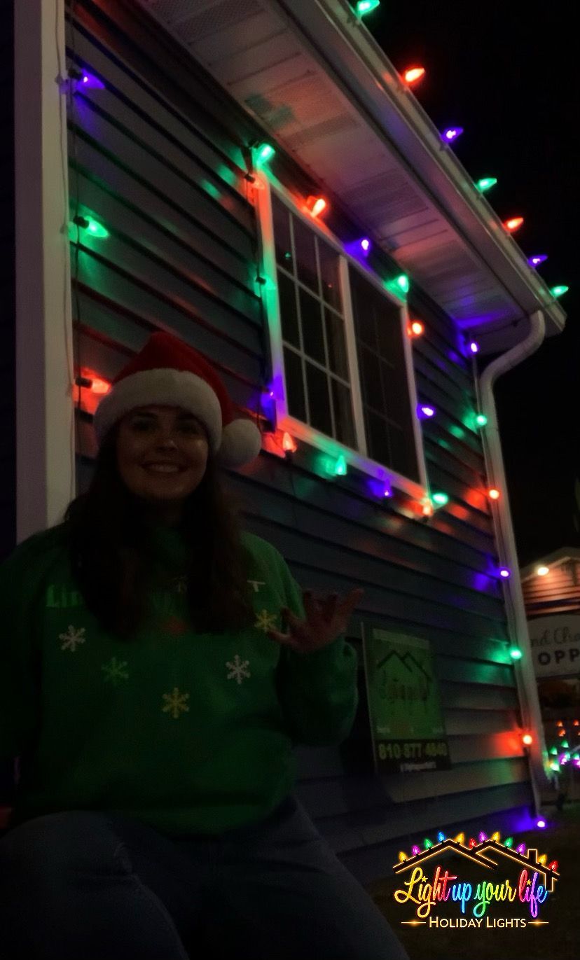 Orange, green, and purple commercial grade halloween lights for a municipal building in downtown Grand Blanc Michigan. 