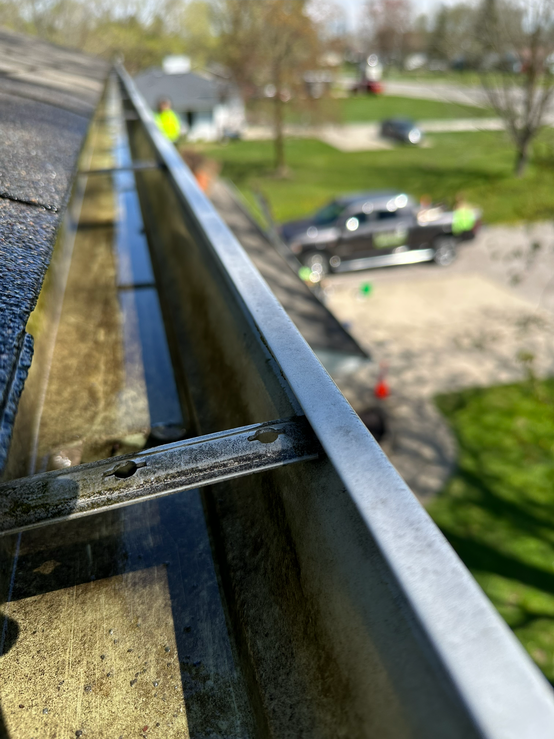 gutters, gutter cleaning, gutter brightening, leaf removal, gutter stick, clogged gutters, clogged downspouts