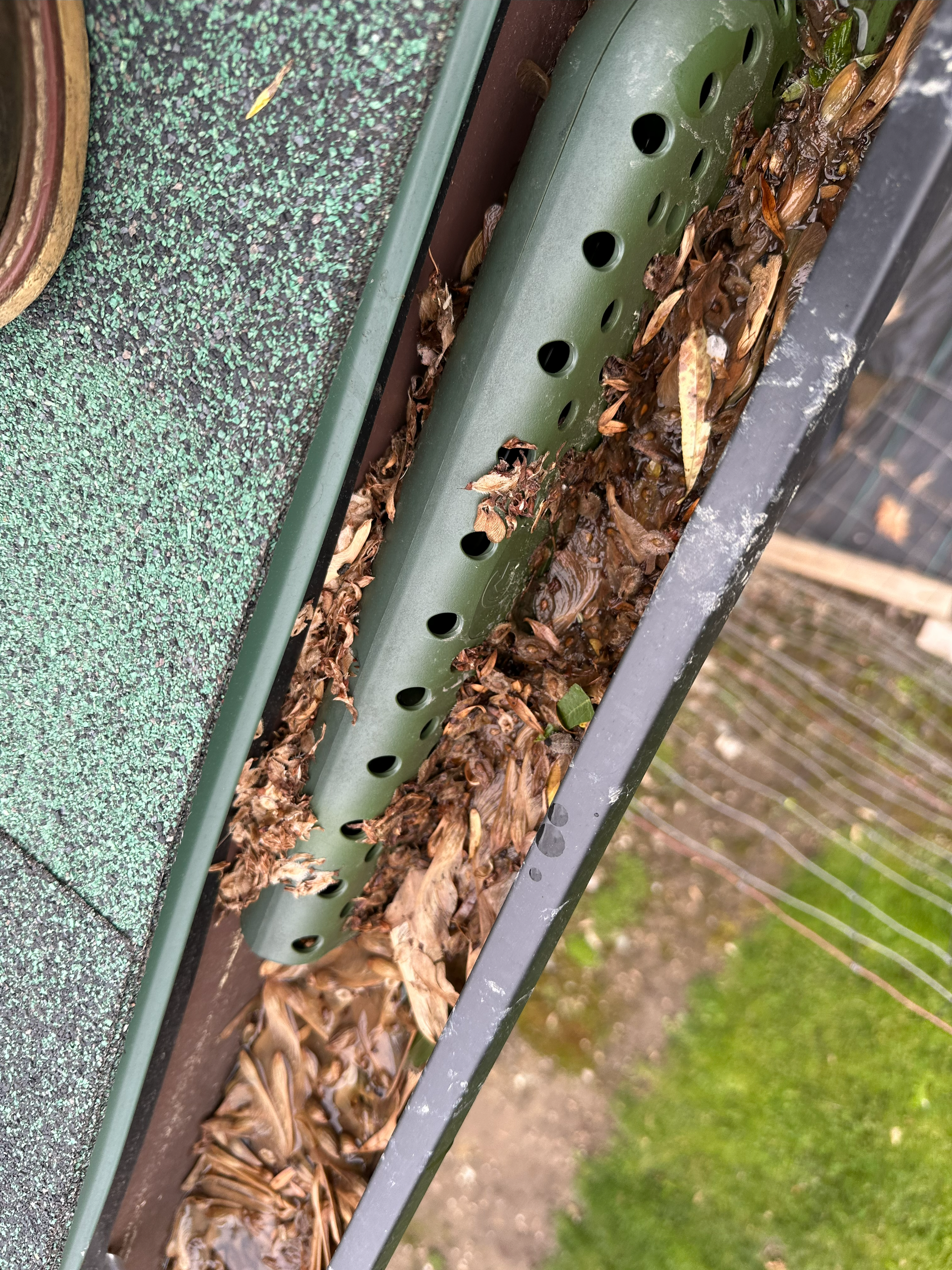 gutters, gutter cleaning, gutter brightening, leaf removal, gutter stick, clogged gutters, clogged downspouts