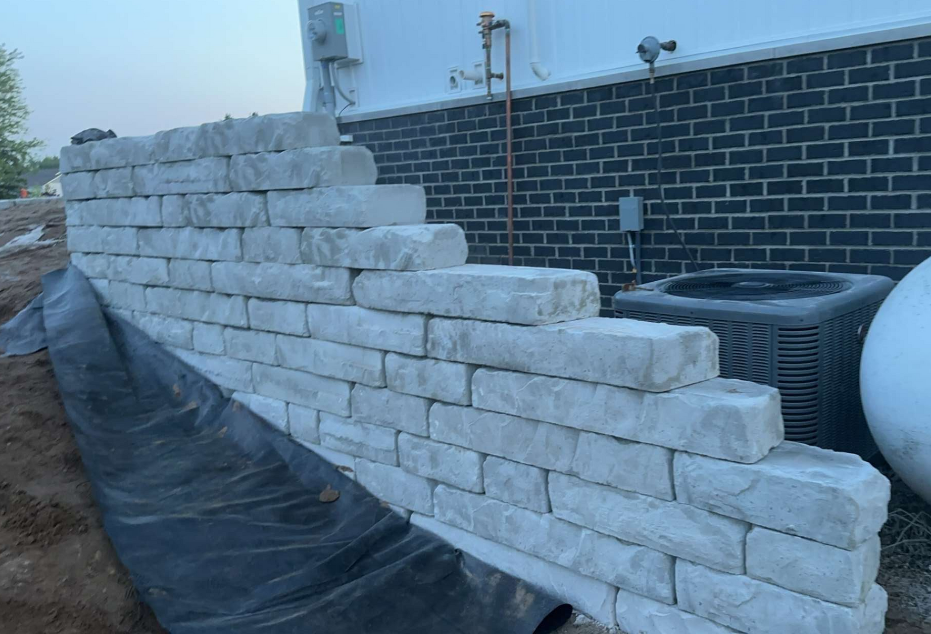 hardscaping, block wall, retaining wall, retainer wall engineered block wall geo grid rosetta kodah wall open graded base