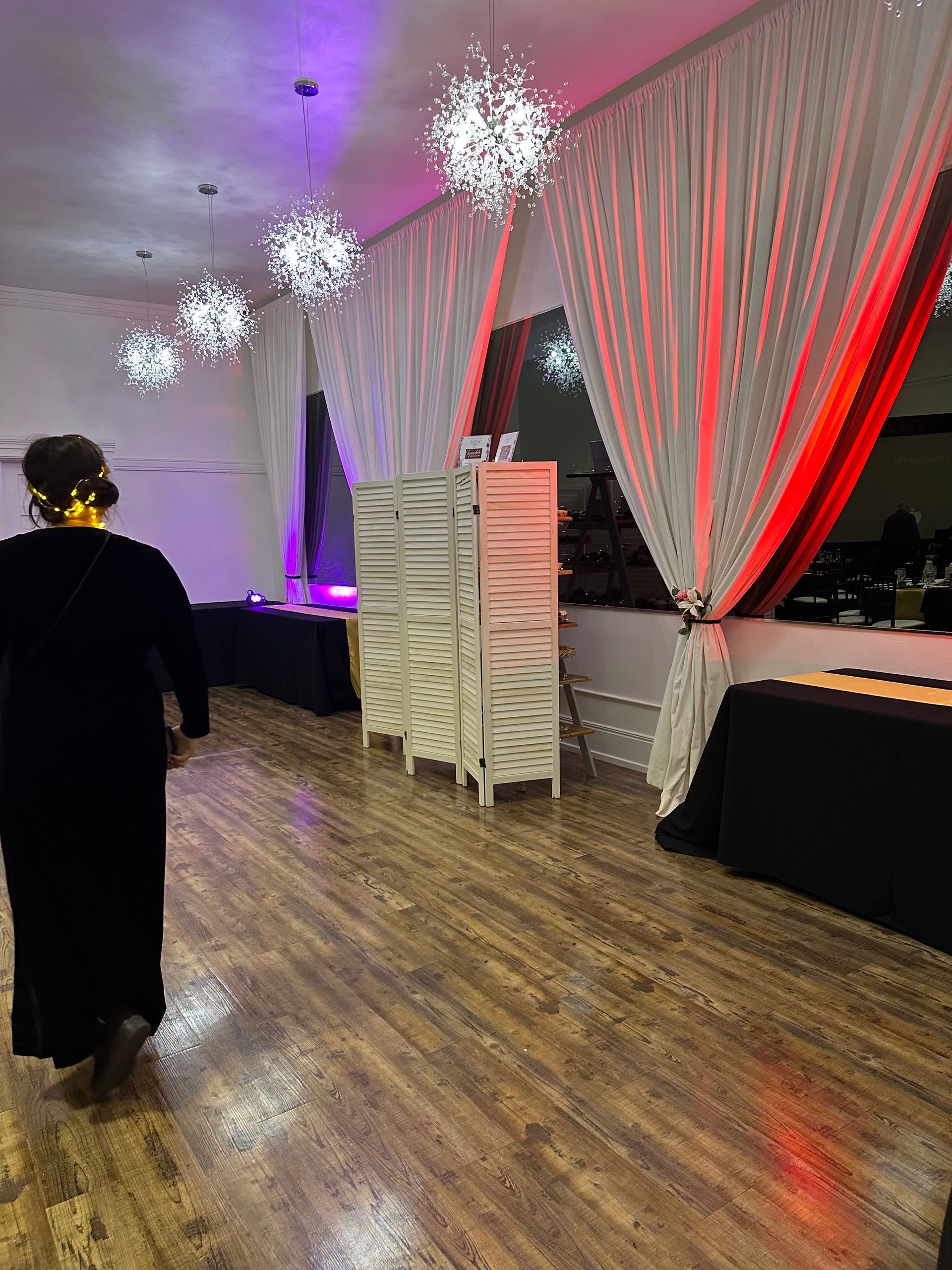 Uplighting, wall washing lights at a commercial venue for a wedding in Michigan. 