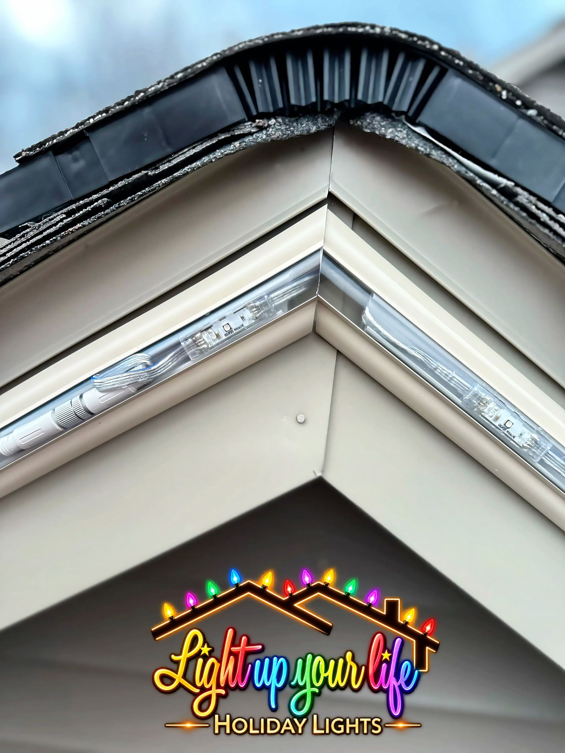 Best Permanent Exterior Lighting project in Michigan. Craftsmen detailed mitre cuts. track that blends in beautifully with the buildings colors so that the track is invisible during the day. 
