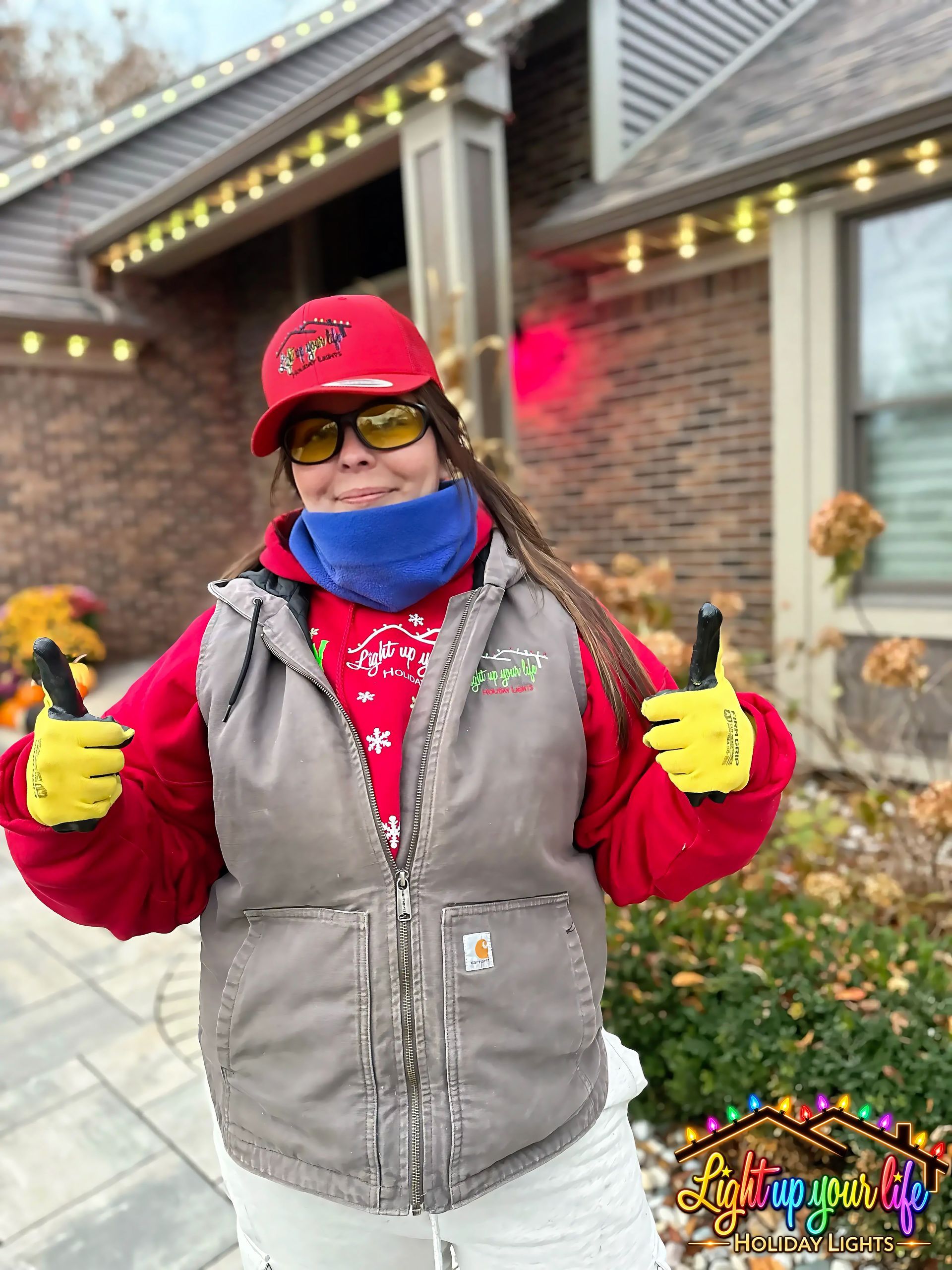 Professional permanent light installer putting two thumbs up for a job well done! light up your life holiday lights pays attention to the smaller details. Great customer support. 

