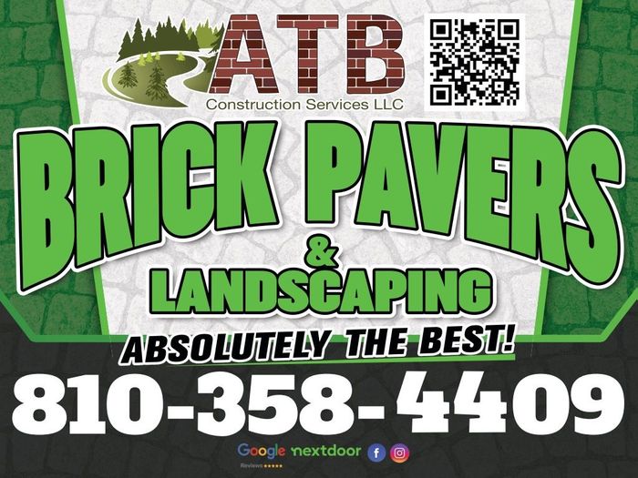 A sign for brick pavers and landscaping with a phone number