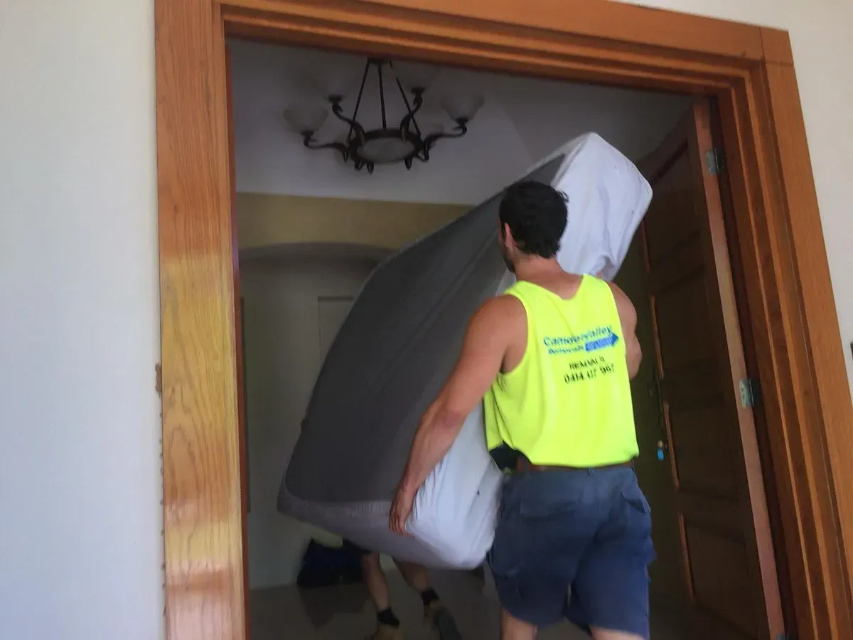 Men carrying bed | Camden, NSW | Camden Valley Removals