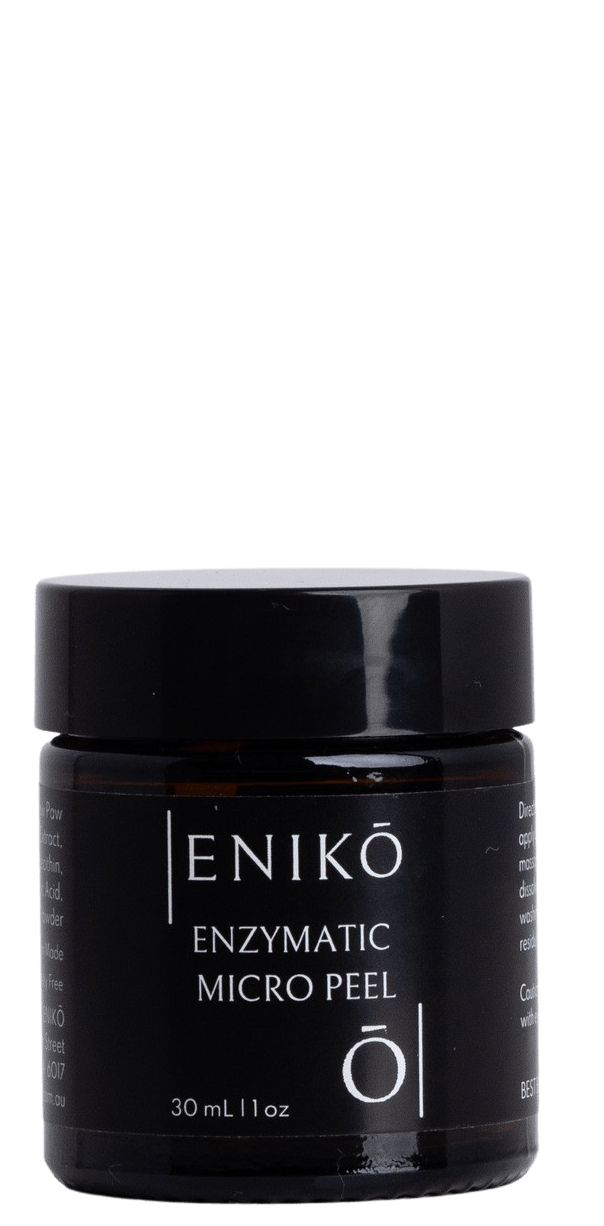 ENIKŌ Enzymatic Micro Peel, a botanical enzyme peel in a black glass jar.