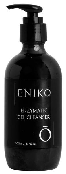 ENIKŌ Enzymatic Gel Cleanser, a gentle botanical gel cleanser in a black pump bottle.