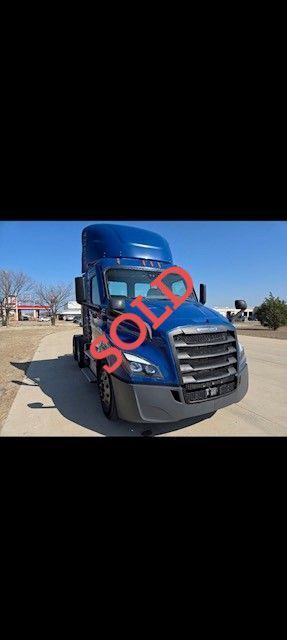 Blue semi-truck with 
