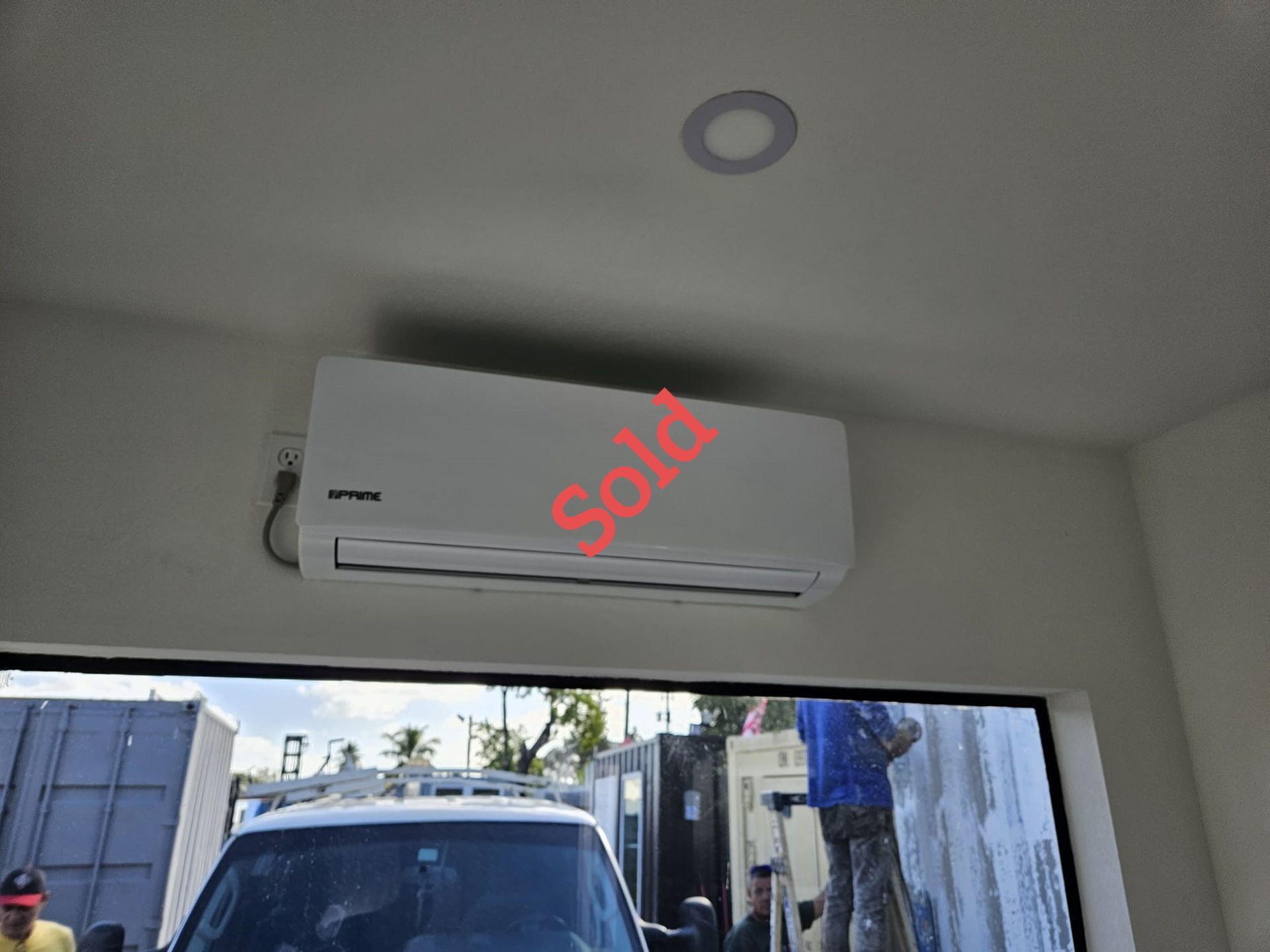 White wall-mounted air conditioner with 