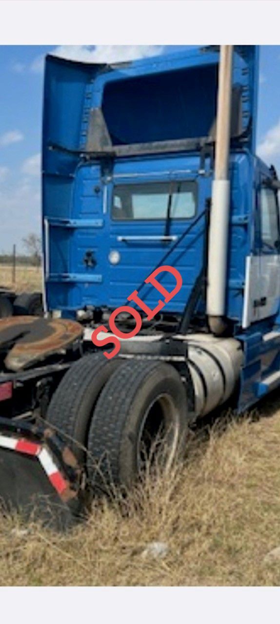 Blue semi-truck with 