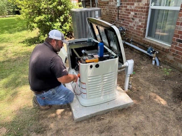 A technician repairing an AC system